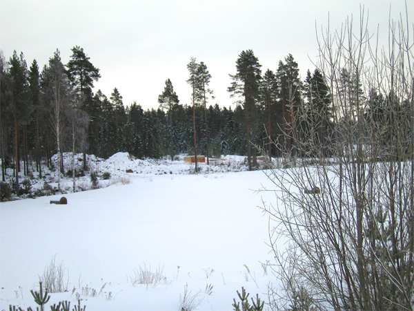 Grävmaskinen vid gropen