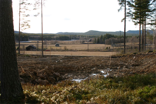 Grävmaskinen vid gropen